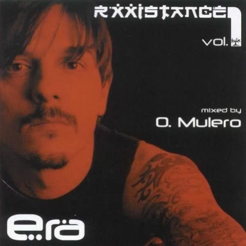 CD cover featuring a man's face and tattooed shoulder in red-tinted lighting.