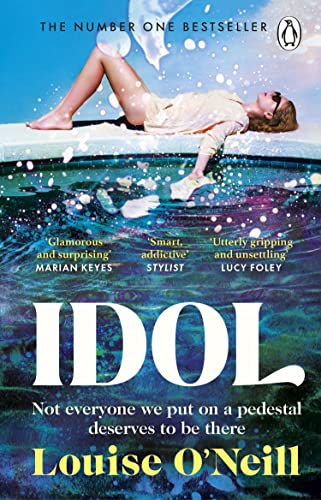 Book cover: woman in white dress reclining by a turquoise pool.
