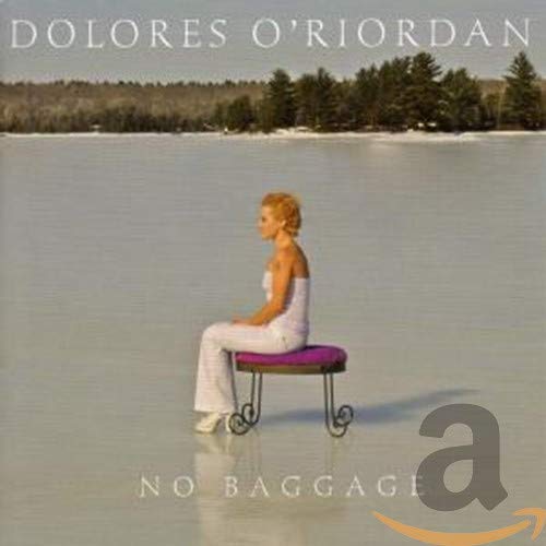 Album cover featuring a woman in white sitting on a purple rolling stool.