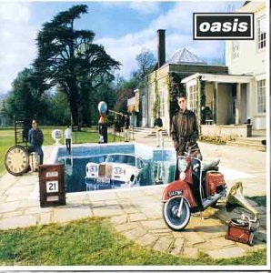 Oasis Be Here Now CD cover showing a car in a pool and a scooter.