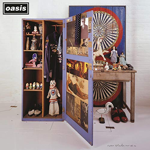 Oasis “Stop The Clocks” album cover: open wardrobe with vintage objects.