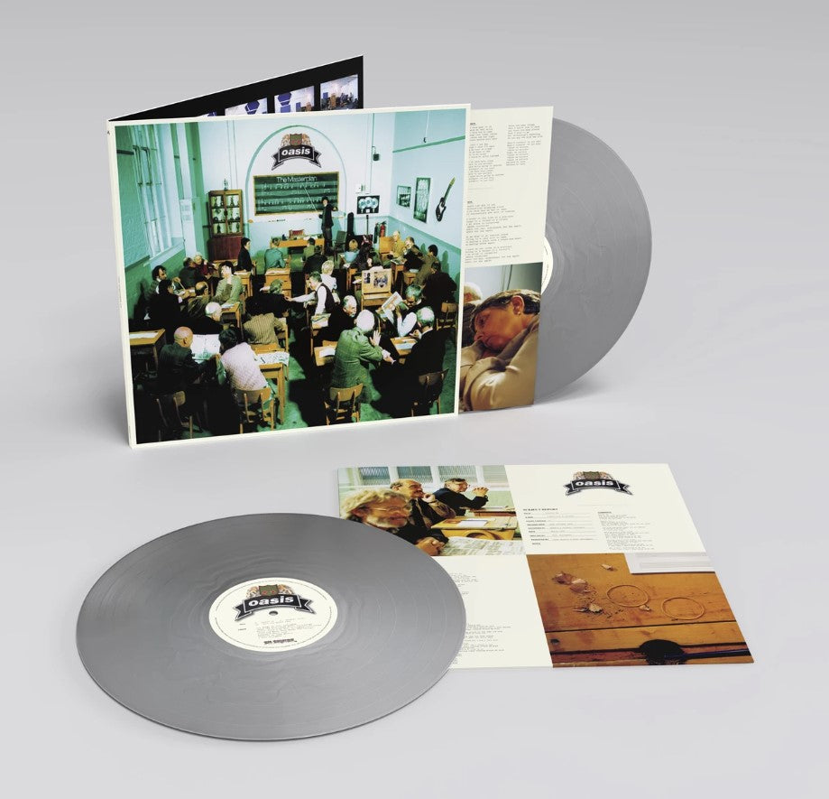 Oasis’ “The Masterplan” album cover: a classroom scene with people.