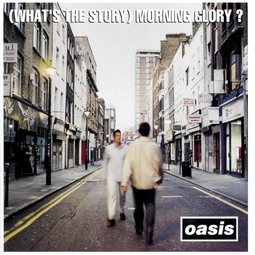 Album cover showing two blurred men walking down a London street with text above.