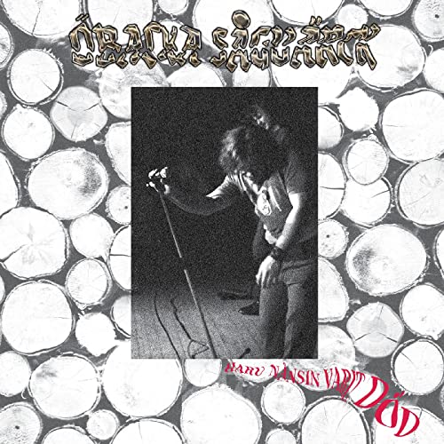 Black and white album cover with a man singing into a microphone on stage.