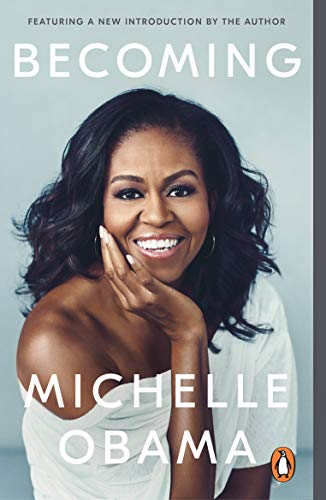 Book cover featuring a smiling portrait of Michelle Obama.