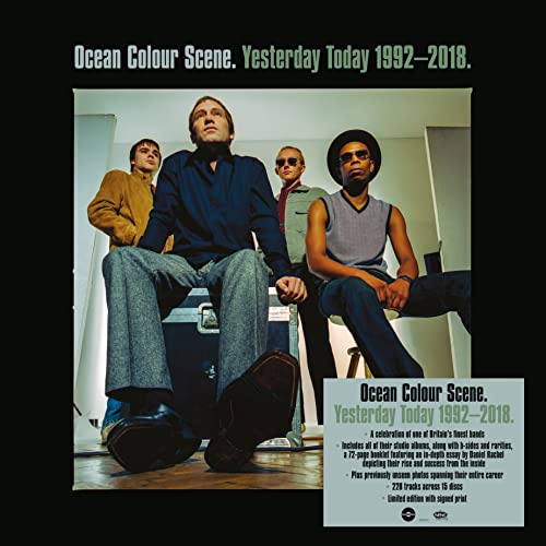 Four members of the band Ocean Colour Scene posing in a studio setting.
