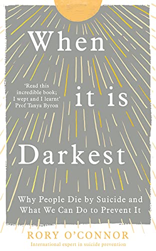 Book cover titled When It Is Darkest by Rory O'Connor with sunburst illustration.