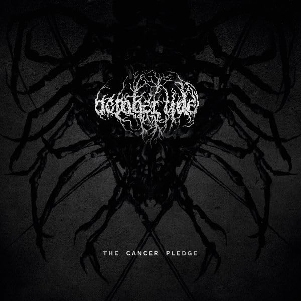 October Tide album cover: dark, spider-like design with band name and title.