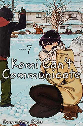 Manga cover featuring Komi in a winter coat crouching in snow with others nearby.