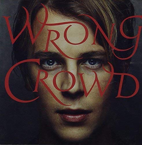 CD cover: close-up of a man’s face with red text overlay.
