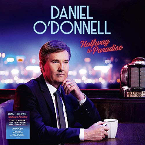 Daniel O’Donnell album cover, “Halfway To Paradise”, with a city backdrop.