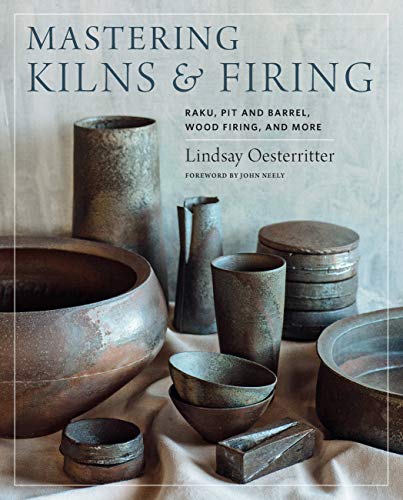 Book cover featuring rustic ceramic vessels, titled "Mastering Kilns & Firing.