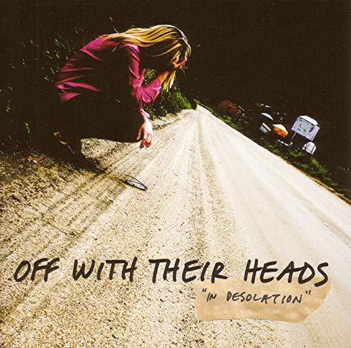 CD cover: woman in red on a desolate country road.