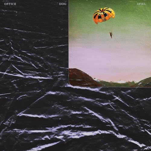 Vinyl cover art showing a person parasailing over mountains against a dark crinkled background.