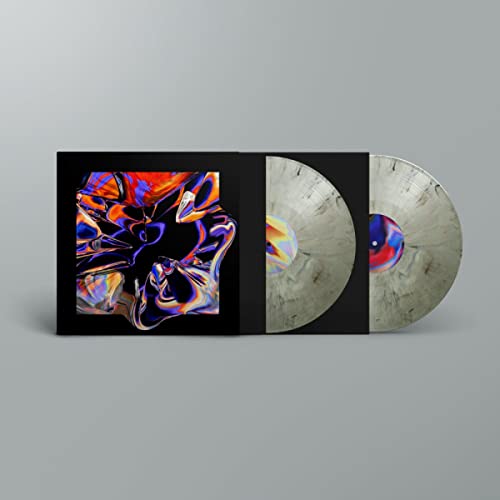 Vinyl record with colorful, abstract album art and marbled grey discs.