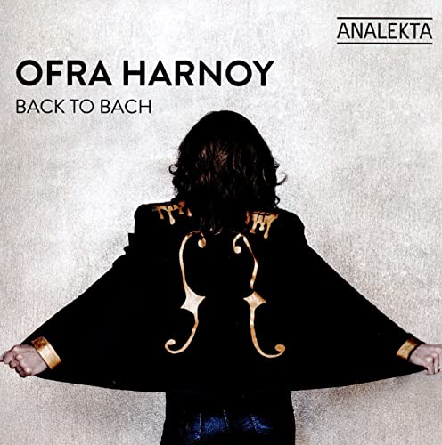 CD cover: Ofra Harnoy, cellist, with cello-shaped design on black coat.