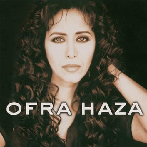 Album cover featuring a portrait of Ofra Haza with long curly brown hair.