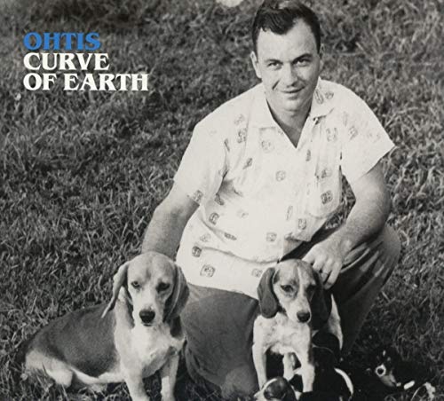 Black and white CD cover featuring a man with two dogs.