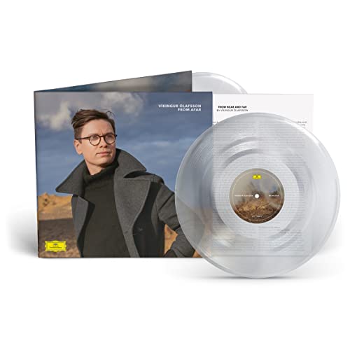 Vinyl record and album cover featuring a portrait of a man.