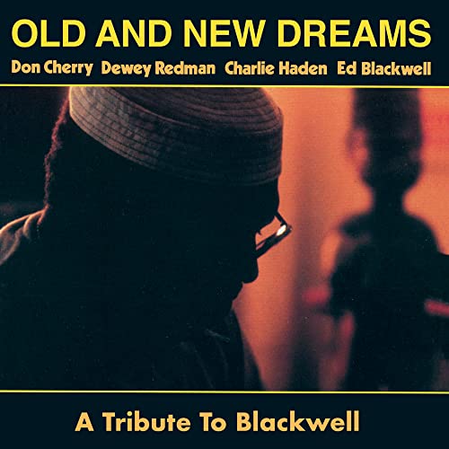 Vinyl album cover featuring a portrait of a man in a hat.