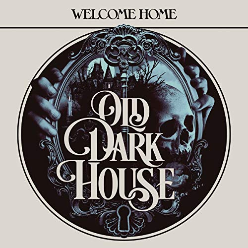 Vinyl record cover: ornate frame with skull, haunted house, and hands.