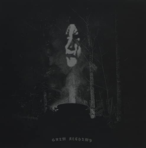 Dark album cover with ghostly figure in a shadowy forest scene.