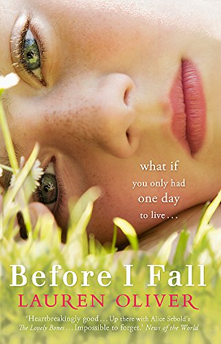 Book cover: close-up of a girl lying in grass, eyes open.