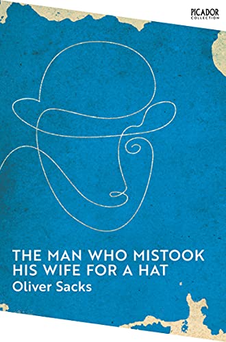 Book cover with a white line drawing of a face and hat.
