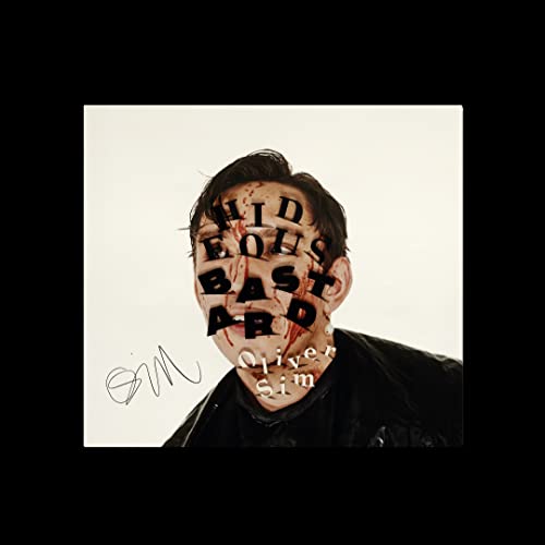 CD cover for Oliver Sim’s “Hideous Bastard” featuring a portrait with text overlay.