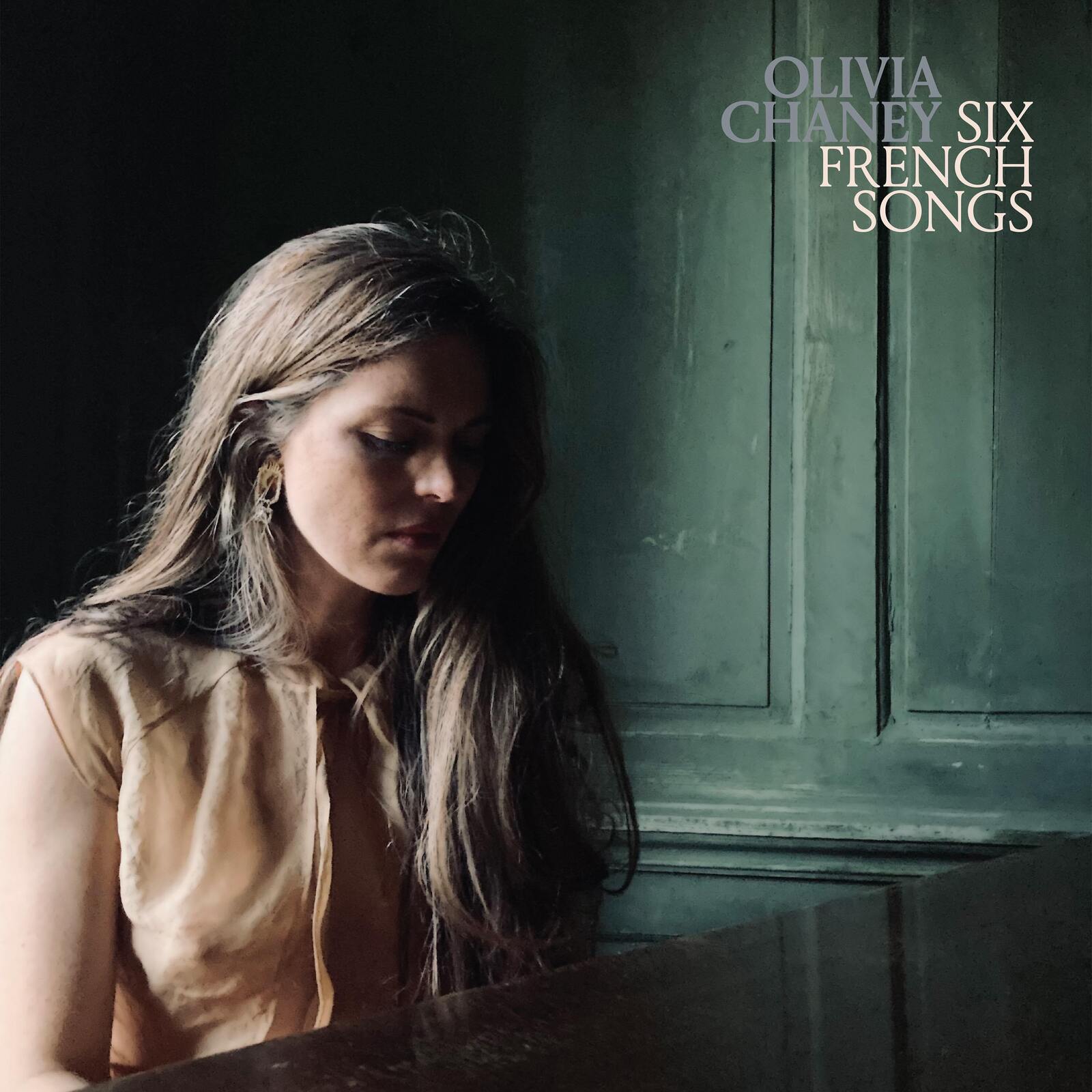 AlbumCandid profileL portrait of Olivia Chaney looking down, with album title in top right.