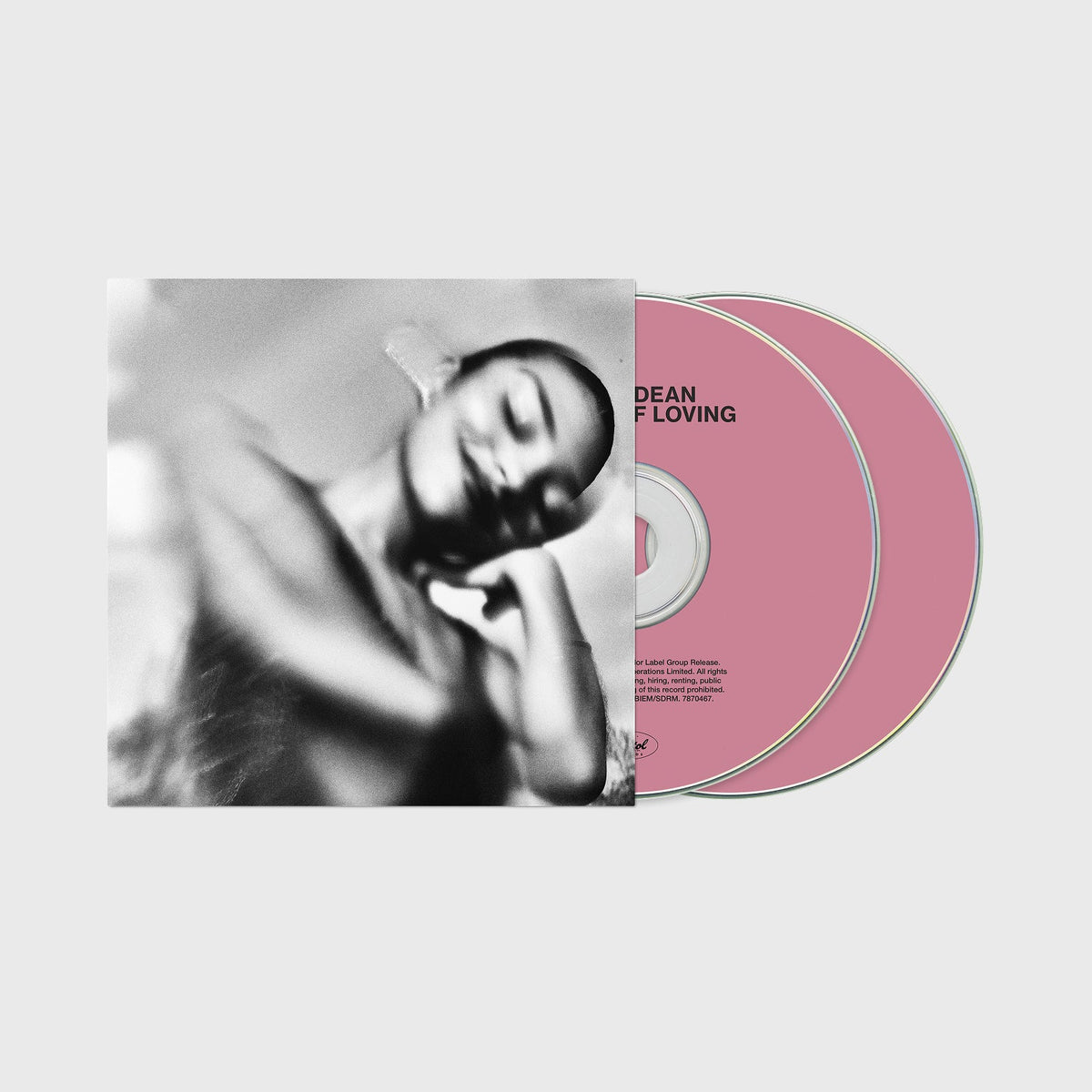 Olivia Dean album "The Art Of Loving" CD and pink disc.
