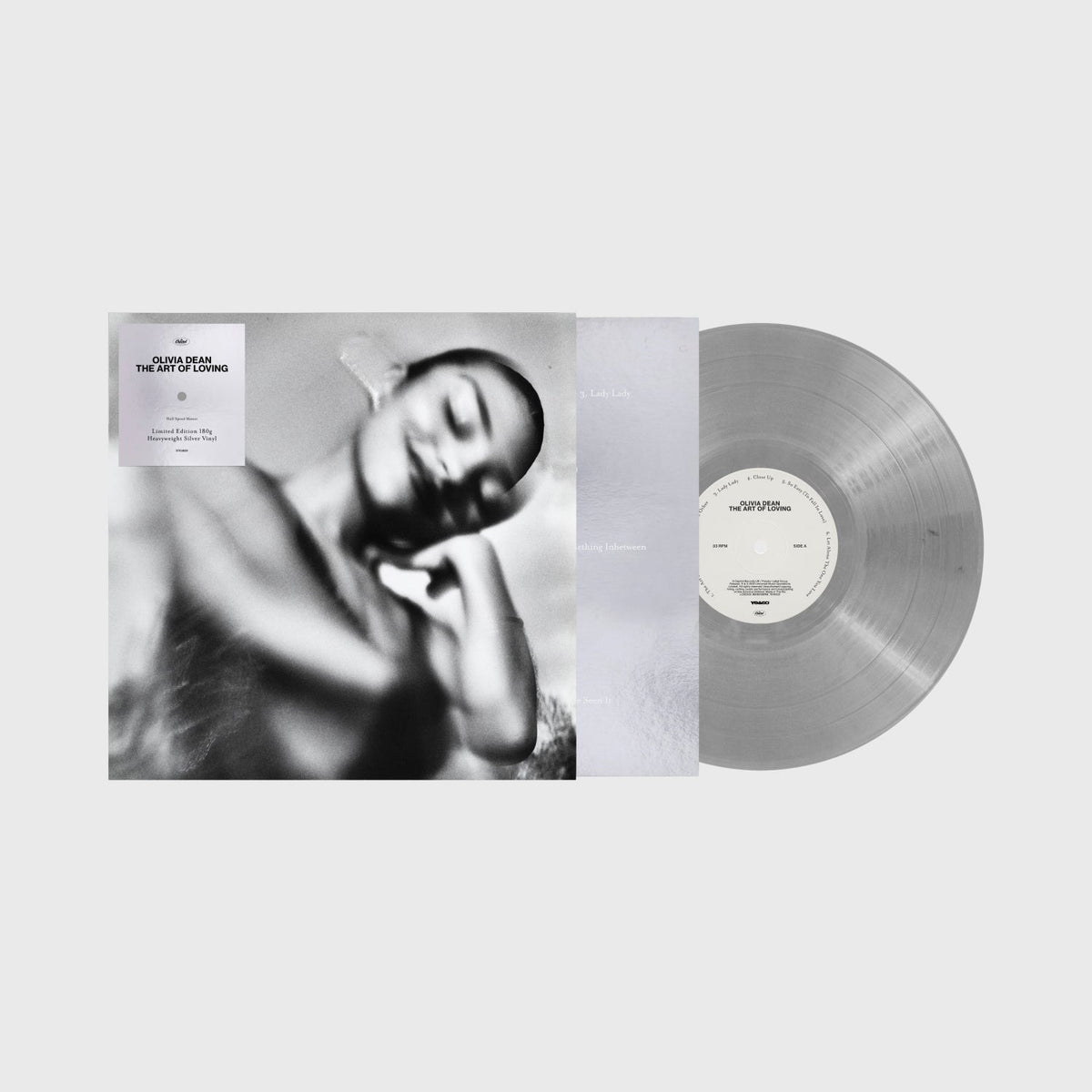 Olivia Dean’s “The Art Of Loving” silver vinyl record and album cover.