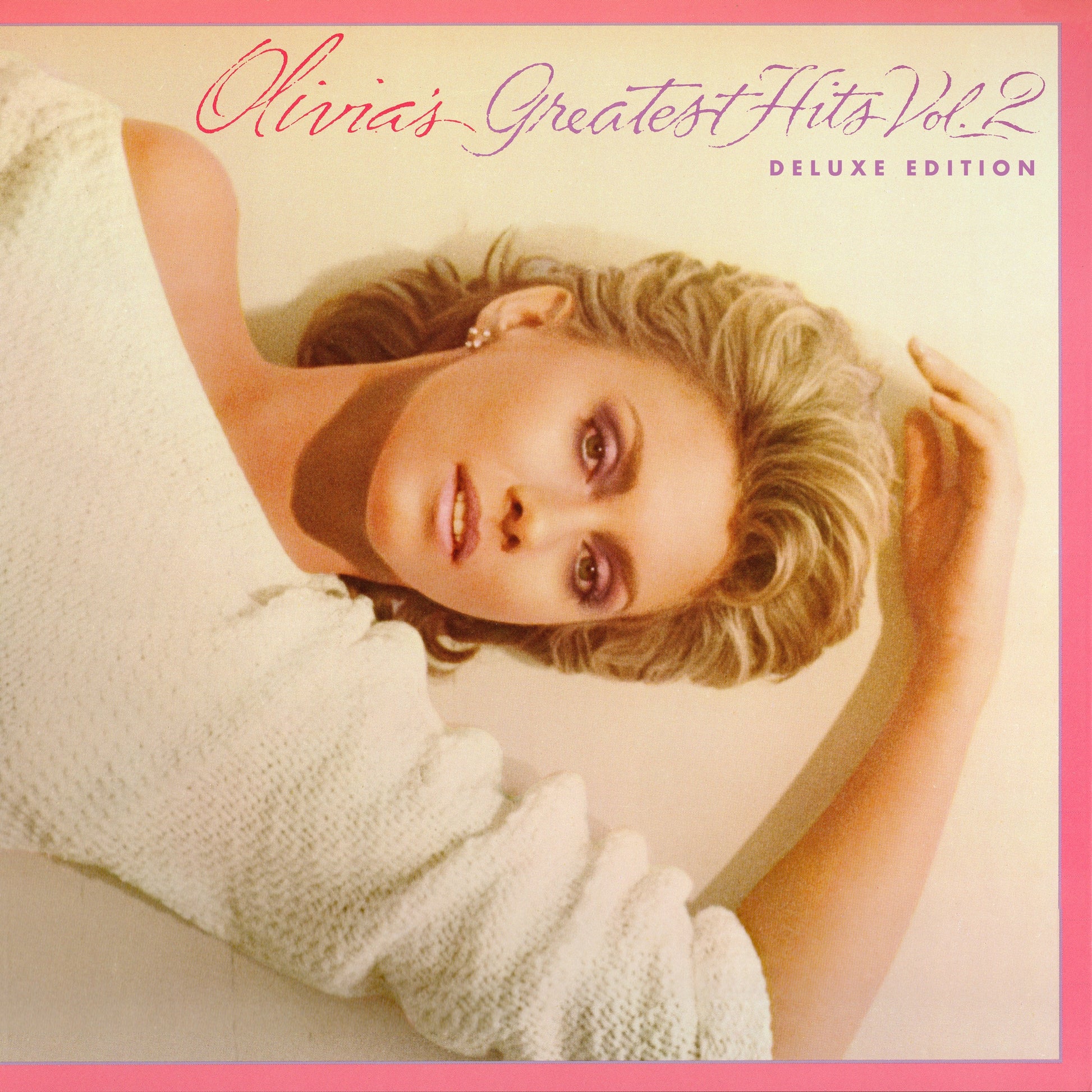 Olivia Newton-John album cover, close-up portrait with pink border.