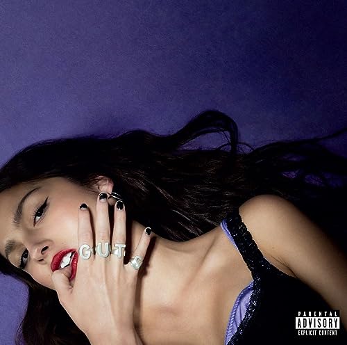 Olivia Rodrigo’s “Guts” album cover: a portrait with bold red lips.