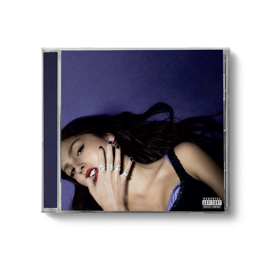"CD case with a woman's portrait on the cover, against a purple background."