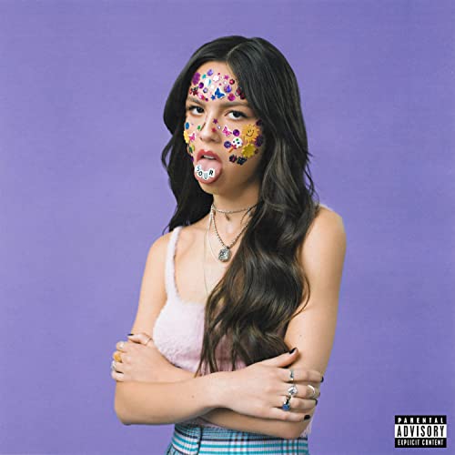 Olivia Rodrigo album cover, "SOUR", with colorful face stickers.