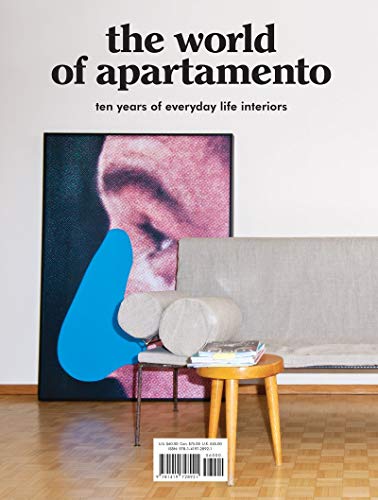 Book cover featuring a modern interior with art and a grey sofa.