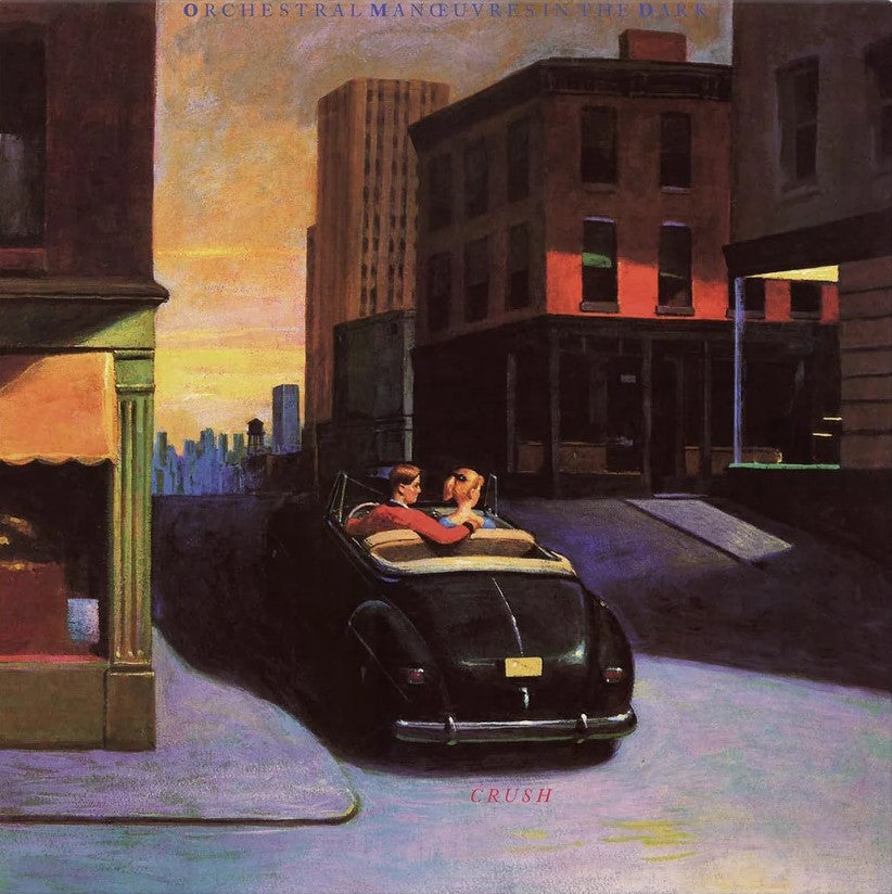 Album cover: Couple in a convertible driving down a city street.