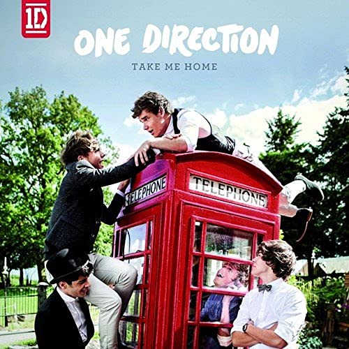 One Direction album cover featuring band members around a red phone box.