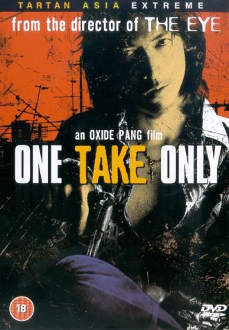 Man with dark hair and white shirt on orange and black DVD cover.