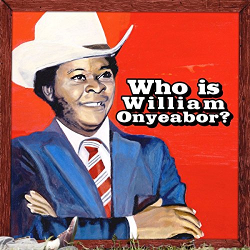 Portrait of William Onyeabor in a white cowboy hat, red background.