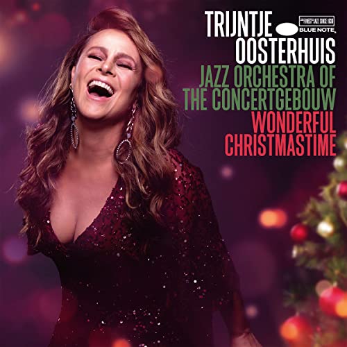 Trijntje Oosterhuis album cover, smiling woman with Christmas decorations.