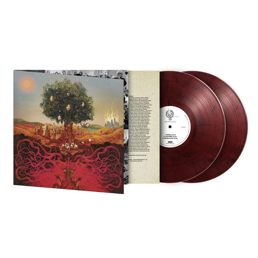 Opeth’s “Heritage” album cover: a painted tree with faces and surreal landscape.