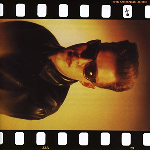 CD cover: man in sunglasses, filmstrip border, orange and black tones.