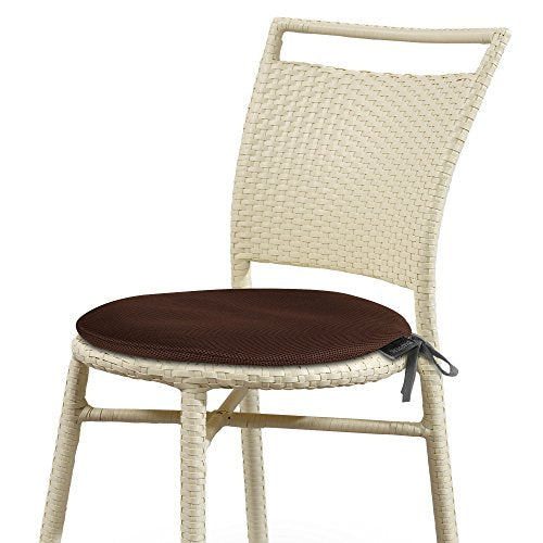 Wicker chair with a dark brown circular seat cushion.