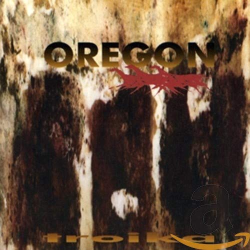 CD cover for "Oregon - Troika" with abstract, textured brown and white design.