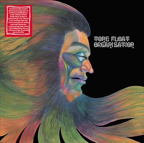 Vinyl cover art featuring a colorful, stylized portrait of a man on black background.