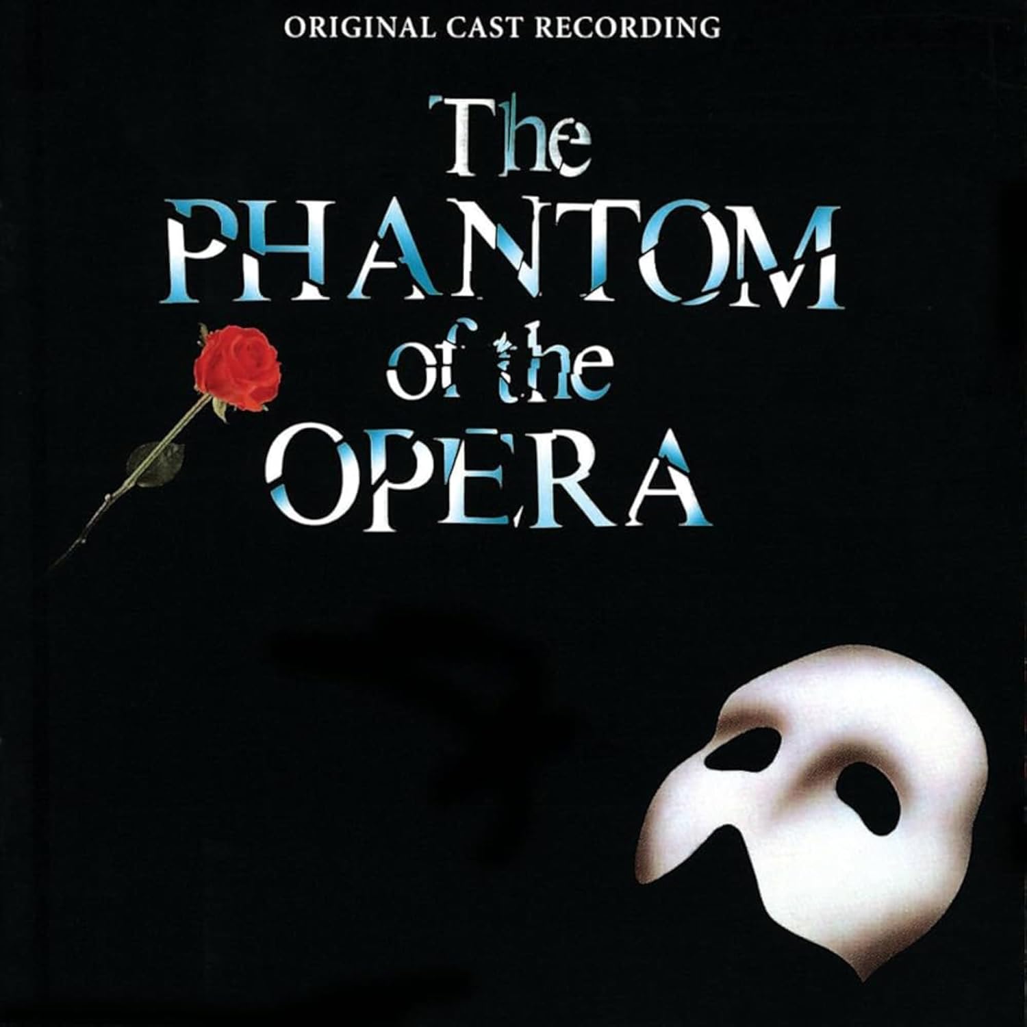 Phantom of the Opera" CD cover with a white mask and red rose.