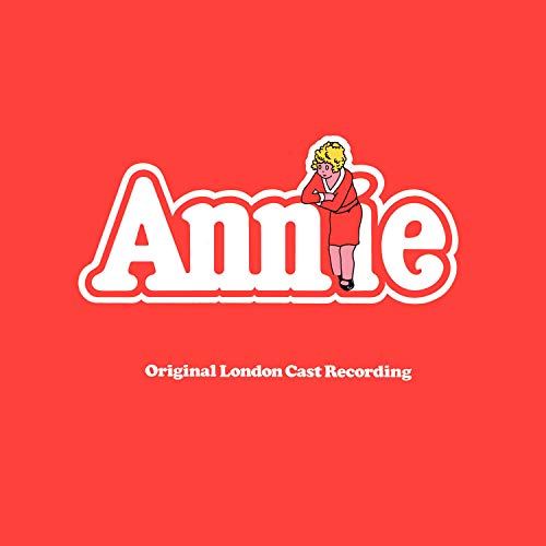 "Red album cover with 'Annie' in white text and cartoon girl illustration."