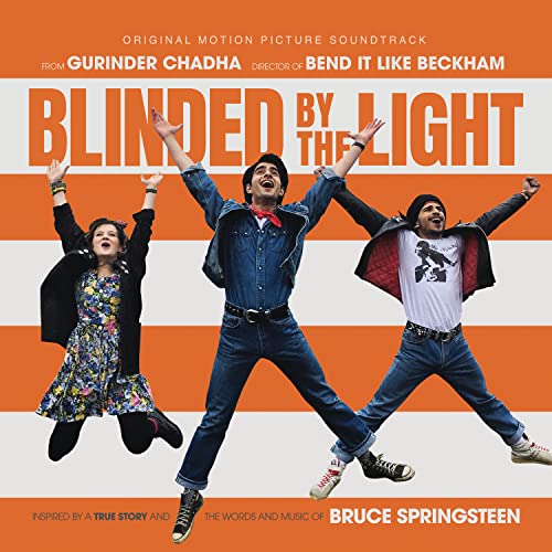 Three people jumping with arms raised on an orange and white striped soundtrack cover.